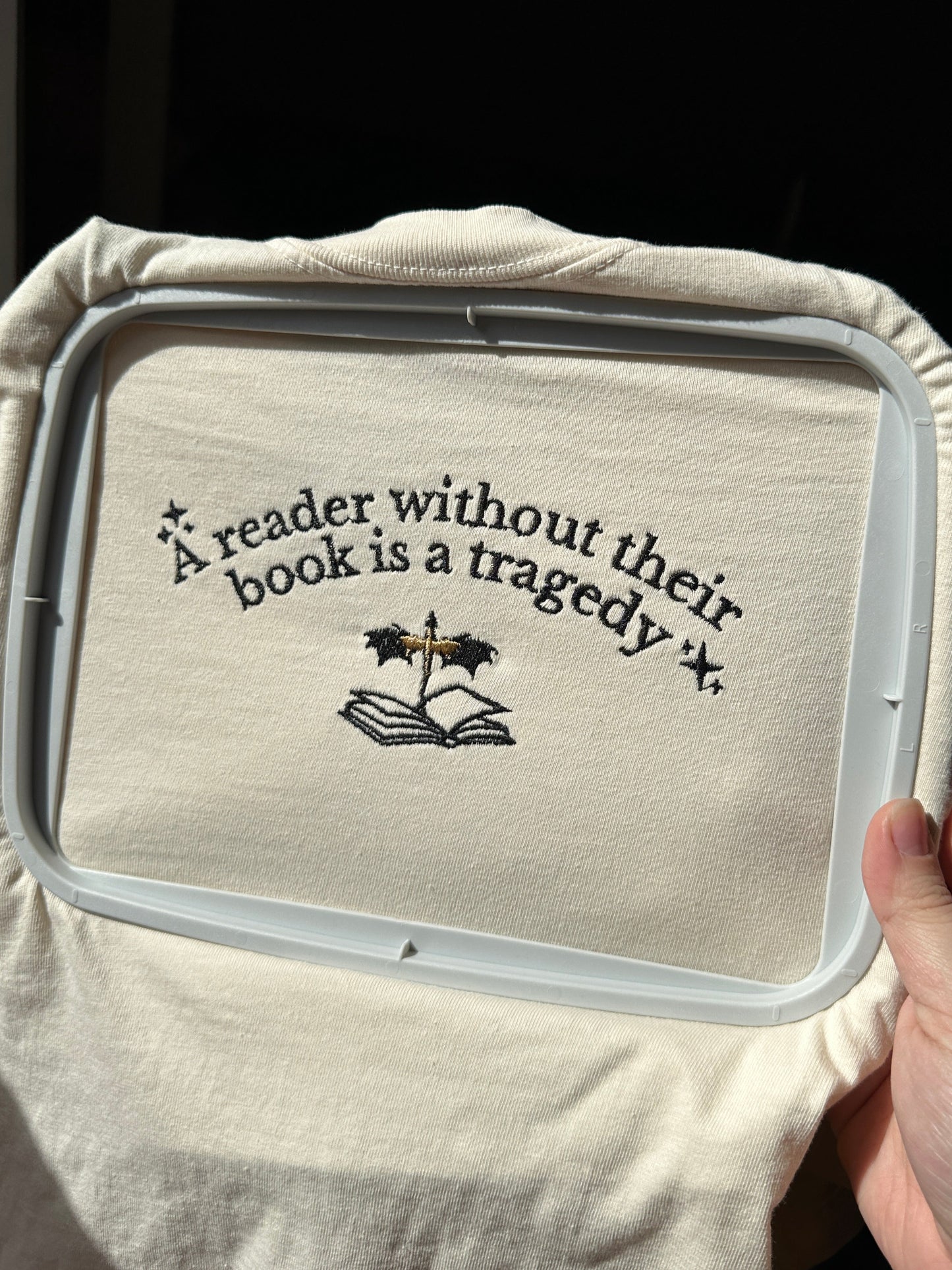A Reader Without Their Book Is A Tragedy T-Shirt