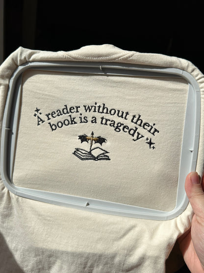 A Reader Without Their Book Is A Tragedy T-Shirt
