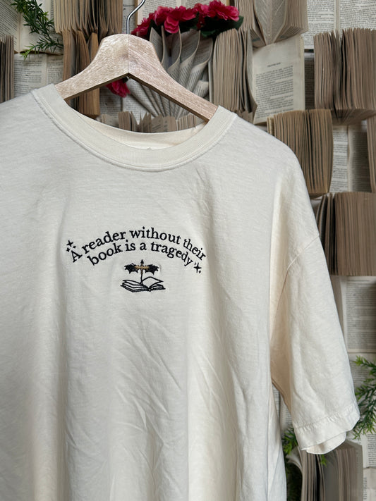 A Reader Without Their Book Is A Tragedy T-Shirt